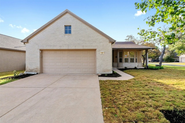 view of front facade featuring a front yard and a garage