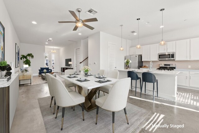 dining area featuring ceiling fan