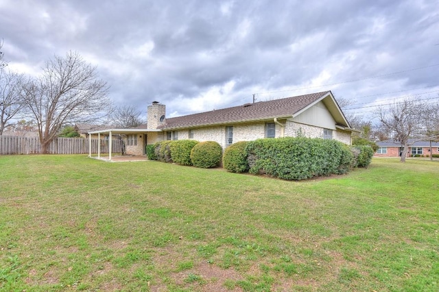 exterior space featuring a lawn