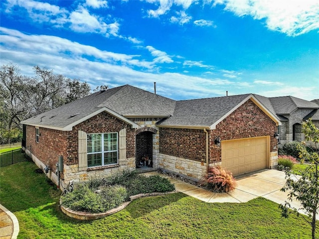 view of front of house featuring a front yard, stone siding, brick siding, and roof with shingles