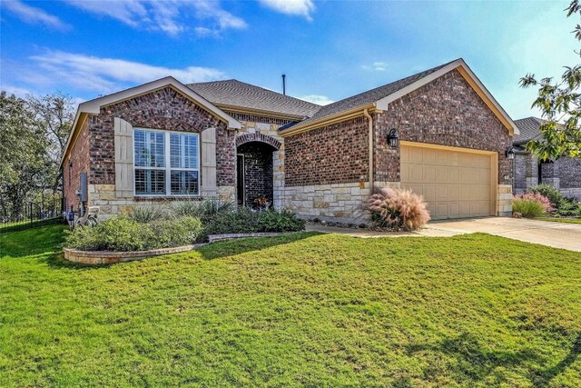 single story home featuring a front yard and a garage