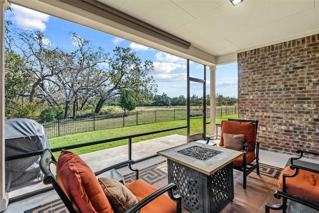 view of patio / terrace featuring a fenced backyard and a fire pit