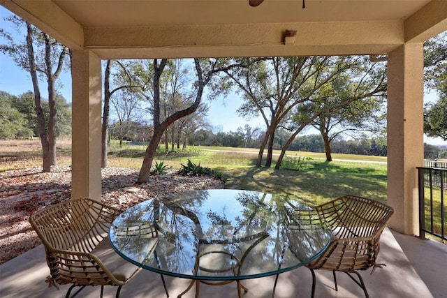 view of patio / terrace featuring ceiling fan