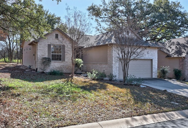 ranch-style home featuring a garage