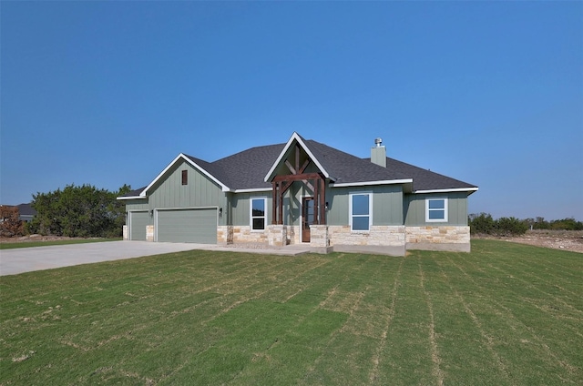 craftsman house with a garage and a front yard