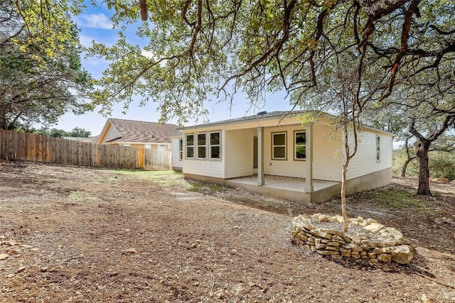 rear view of house featuring a patio area