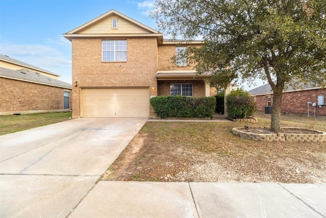 6204 Taree Loop, Killeen, TX 76549 - traditional-style house with brick siding, an attached garage, and driveway