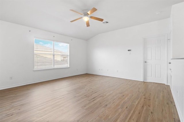 6204 Taree Loop, Killeen, TX 76549 - empty room featuring light wood finished floors, ceiling fan, baseboards, and lofted ceiling