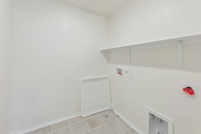 14013 Vigilance St, Manor, TX 78653 - laundry room featuring hookup for a washing machine, gas dryer hookup, and light tile patterned flooring