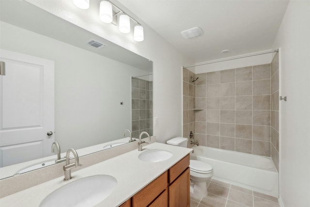 14013 Vigilance St, Manor, TX 78653 - bathroom with double vanity, tub / shower combination, and tile patterned floors