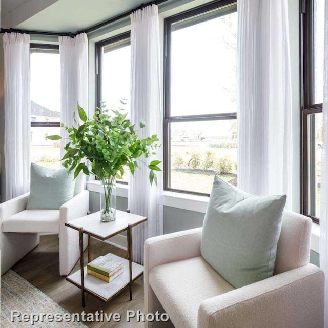 living area featuring hardwood / wood-style floors