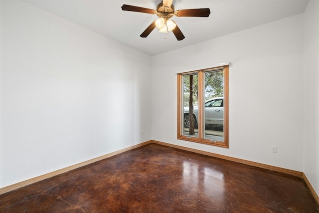 unfurnished room featuring concrete flooring and ceiling fan