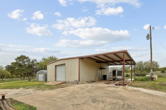 view of outdoor structure with a garage