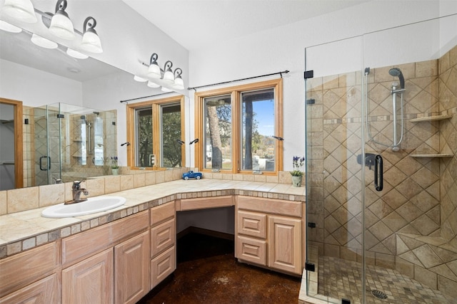 bathroom with vanity and walk in shower