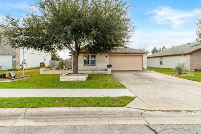 ranch-style home featuring a garage and a front lawn