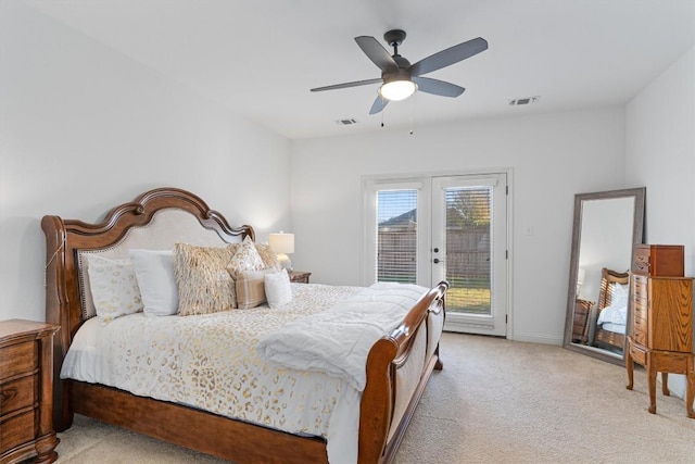 carpeted bedroom featuring access to outside, ceiling fan, and french doors