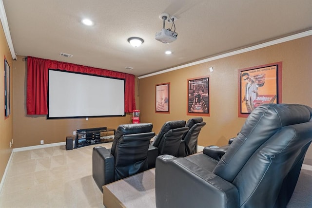 home theater featuring light colored carpet, a textured ceiling, and ornamental molding