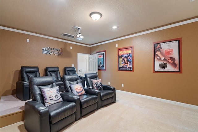 carpeted home theater featuring a textured ceiling and ornamental molding