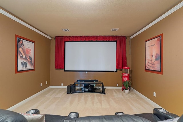 home theater with a textured ceiling, carpet floors, and crown molding