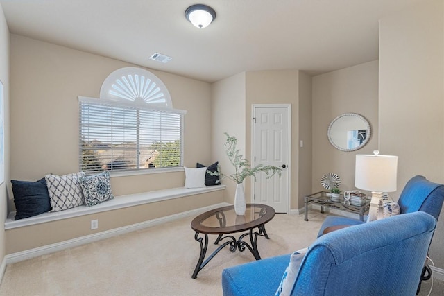 sitting room with light carpet