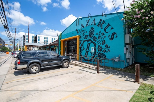 view of property with uncovered parking