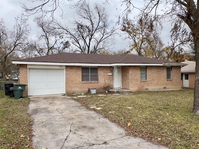 ranch-style home with a front yard and a garage