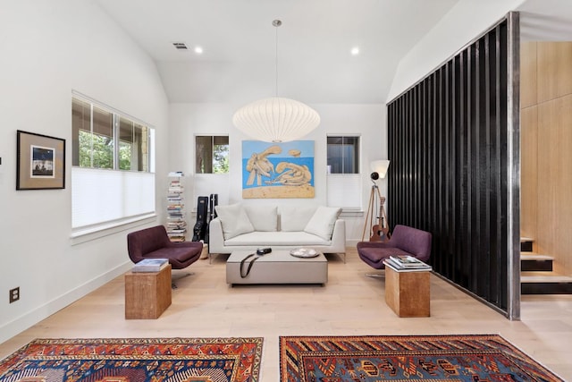 1005 Jewell St, Austin, TX 78704 - living room featuring lofted ceiling, recessed lighting, and wood finished floors