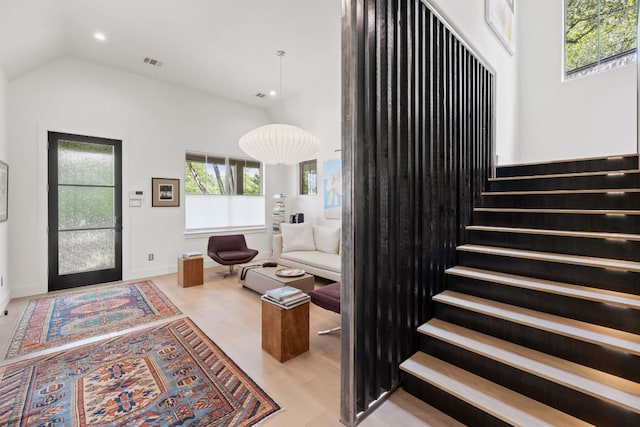 1005 Jewell St, Austin, TX 78704 - entrance foyer featuring stairs, vaulted ceiling, and recessed lighting