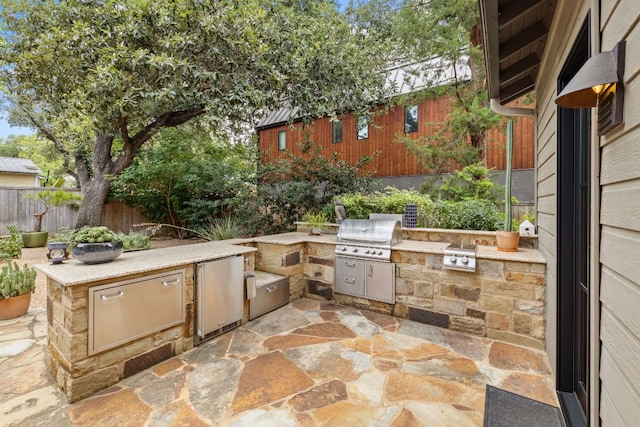 1005 Jewell St, Austin, TX 78704 - view of patio featuring exterior kitchen