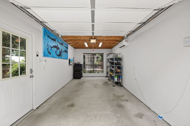 1005 Jewell St, Austin, TX 78704 - garage featuring a wall mounted air conditioner