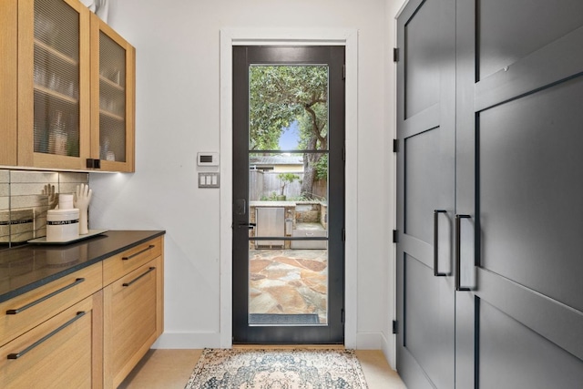 1005 Jewell St, Austin, TX 78704 - doorway featuring baseboards