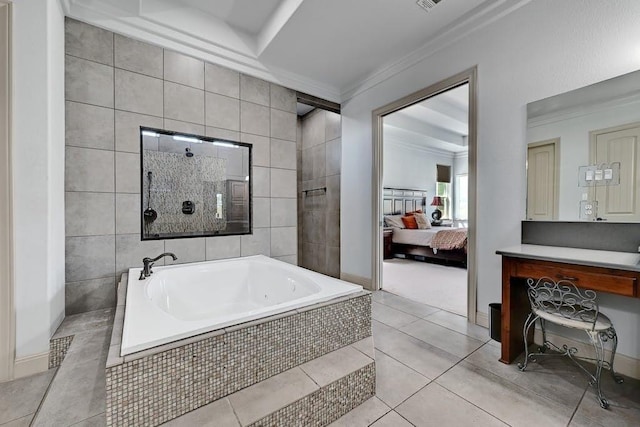 bathroom with tile patterned floors, ornamental molding, and tiled bath