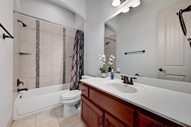 full bathroom featuring tile patterned flooring, vanity, shower / tub combo, and toilet