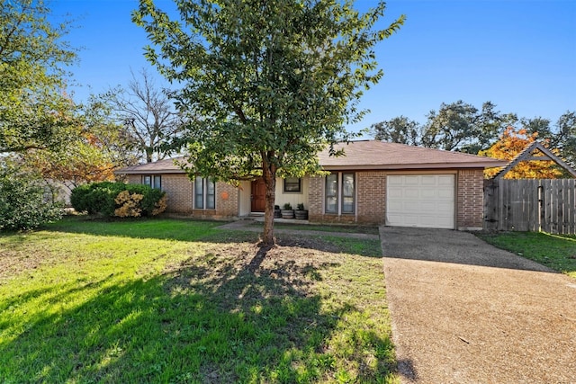 single story home with a garage and a front lawn