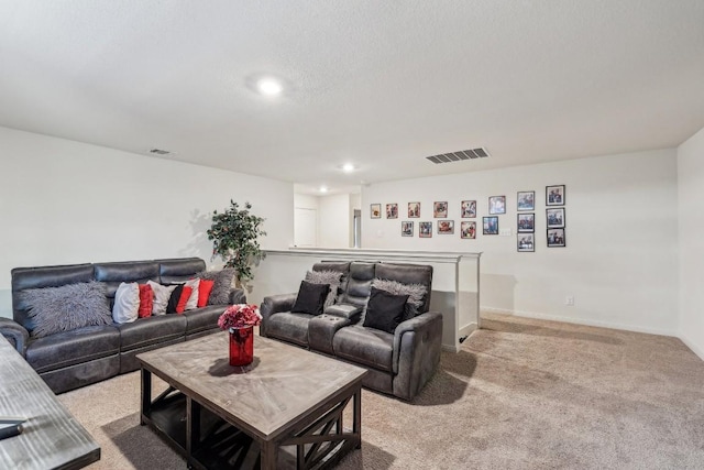 living room with light colored carpet