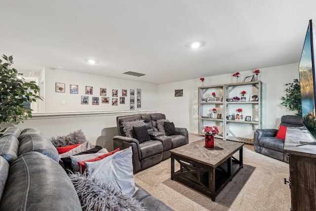 living room featuring light carpet