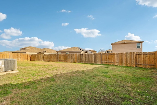 view of yard featuring central AC unit