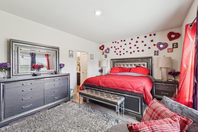 bedroom featuring ensuite bathroom