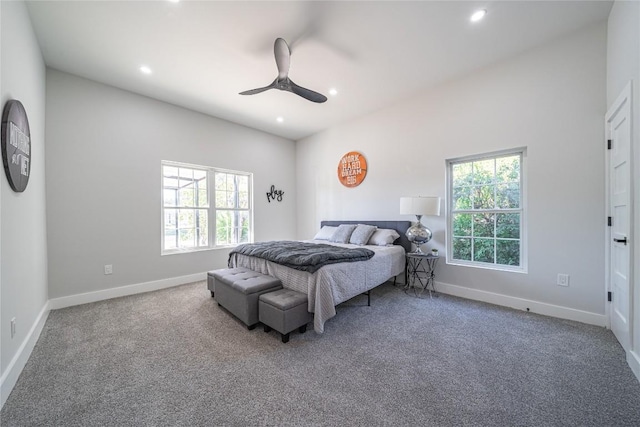 carpeted bedroom featuring ceiling fan