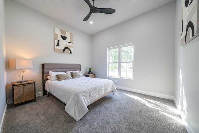 bedroom with dark carpet and ceiling fan