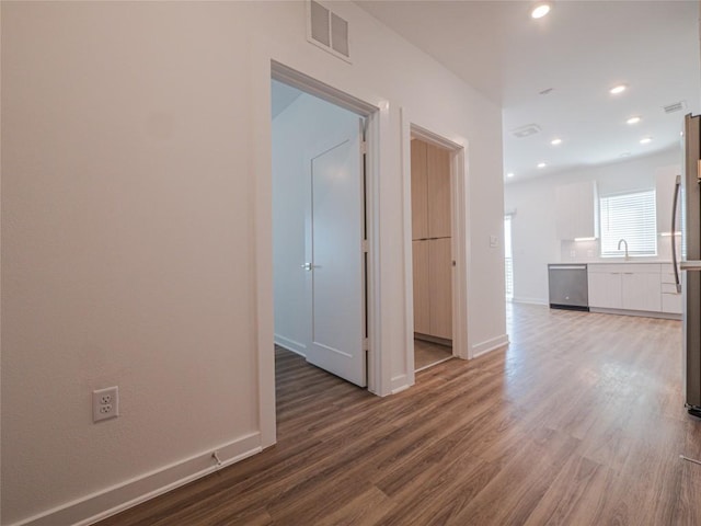 hall featuring wood-type flooring