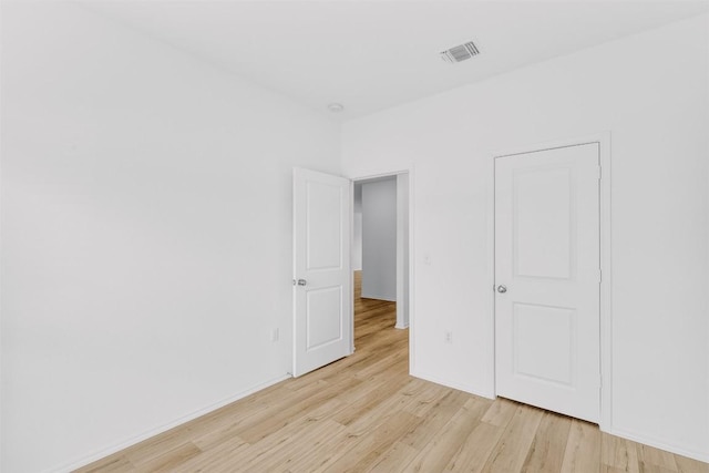 unfurnished bedroom with light hardwood / wood-style flooring