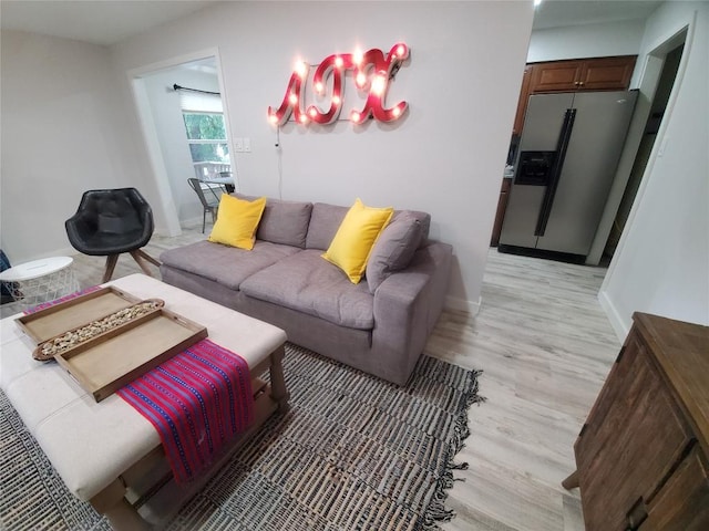 living room with light hardwood / wood-style floors