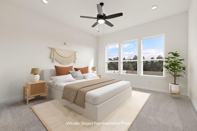 bedroom featuring ceiling fan and carpet floors