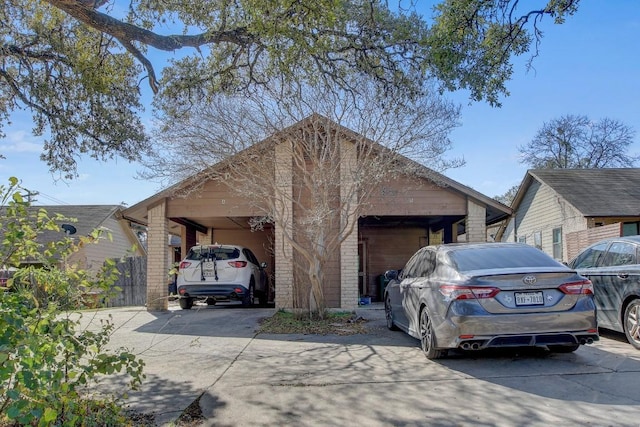 view of front of property with a carport