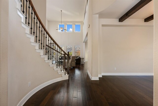 2715 Mariposa Way, Round Rock, TX 78665 - foyer with hardwood / wood-style floors, a ceiling fan, stairs, and a high ceiling