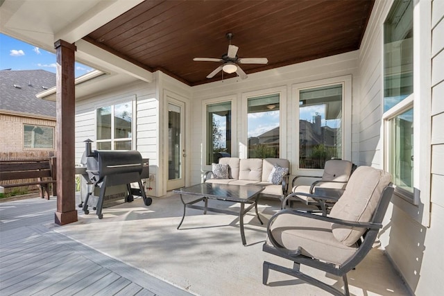 view of patio / terrace with grilling area, ceiling fan, and outdoor lounge area