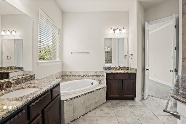 2715 Mariposa Way, Round Rock, TX 78665 - full bath featuring a garden tub and two vanities