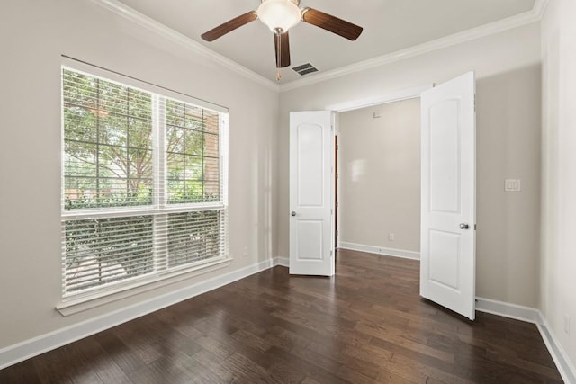 2715 Mariposa Way, Round Rock, TX 78665 - spare room with dark wood-style floors, ceiling fan, and ornamental molding
