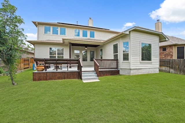 2715 Mariposa Way, Round Rock, TX 78665 - rear view of house with a chimney, a fenced backyard, and a ceiling fan